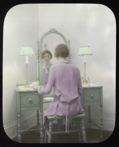 Woman_at_mirror,_circa_1930s