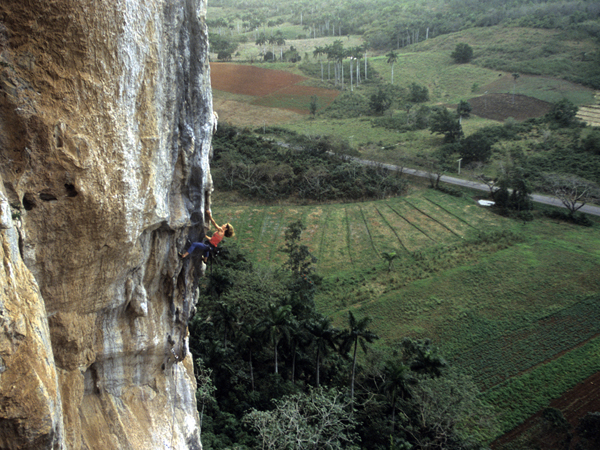 Climbing on limestone cliffs in Viñales Valley, Piñar del Rio Province, Cuba